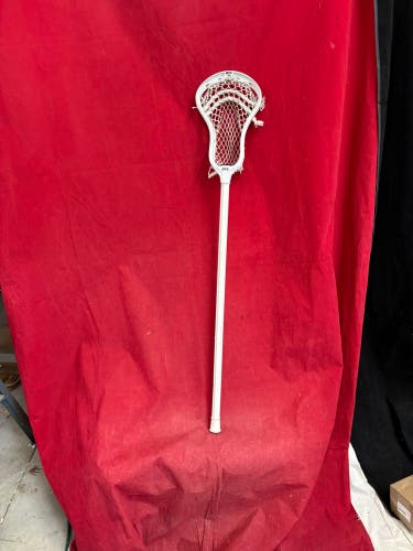 Lacrosse Stick: STX brand lacrosse stick with a white head and shaft. Size: M 40” top to bottom