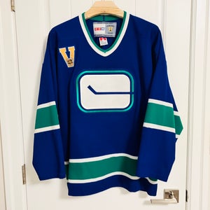 Authentic CCM Vancouver Canucks Stick In Rink Blue Jersey Size Large