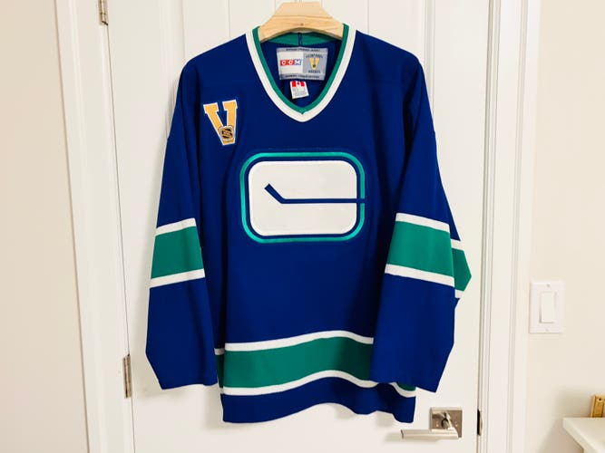 Authentic CCM Vancouver Canucks Stick In Rink Blue Jersey Size Large