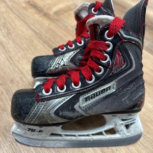 Black 2009 Bauer Vapor X60 Hockey Skates Regular Width 11.5 (Used)