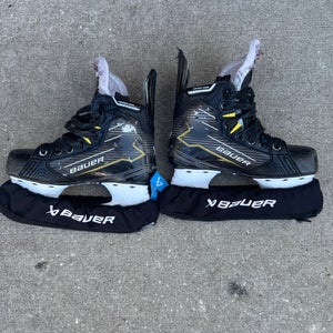 Black/Yellow 2024 Bauer Supreme M40 Hockey Skates Regular Width Size 2 (Used)