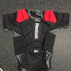 Reebok 9K padded shirt L