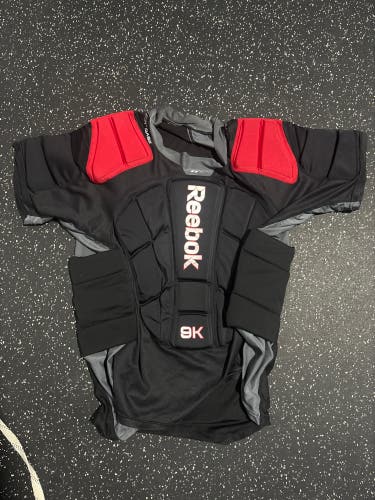 Reebok 9K padded shirt L