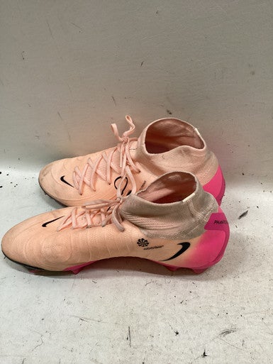 coral nike cleats