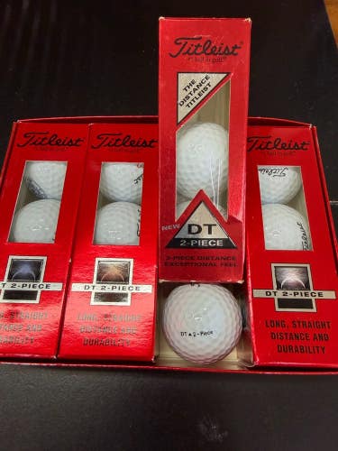 12 New in Box DT 2 Piece Titleist Golf Balls