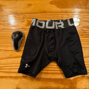 Black Boy’s  Medium Youth Under Armour utility sliding shorts with cup (Used)