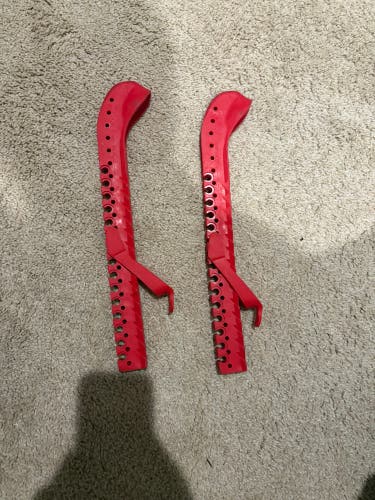 Red hockey ROLLERGARD skating gaurds