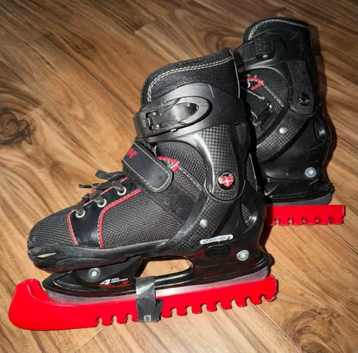 Kids Black Schwinn adjustable 4 sizes Hockey Skates Regular Width size Y12 Y13 1 2