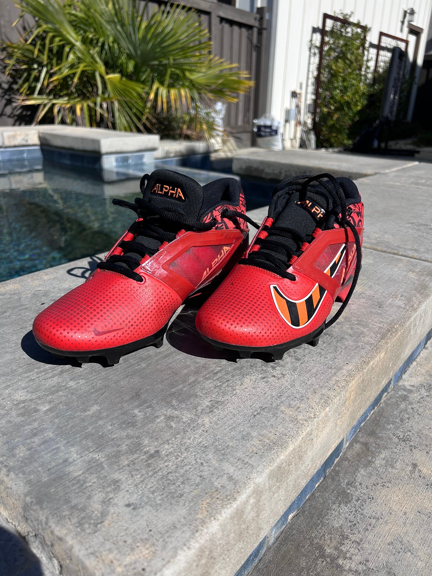 nike football cleats black and red