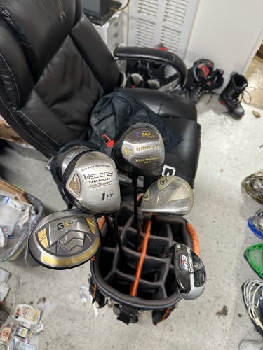 Seven Right Handed Woods, Hybrids, and Drivers w/ Golf Bag