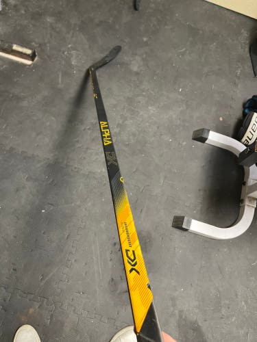 Senior Warrior Alpha DX Right Handed Hockey Stick Toe Pattern 95 Flex Pro Stock (Used)