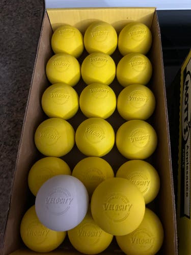 Lot of 31 lacrosse balls. 23 Velocity, 6 Champion, 2 pearl
