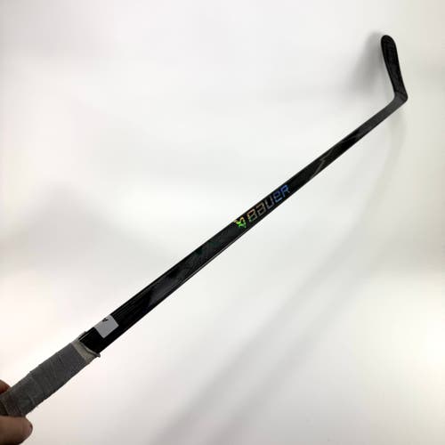 Used Left Black Bauer Flylite | 107 Flex P92M Curve Grip | A491