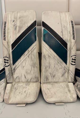 Warrior Ritual G6 E+ Goalie Leg Pads, 31" Intermediate, White with PadSkinz (Used)