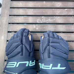 13.5” True Catalyst 9X Seattle Kraken Bjorkstrand #22 NHL Pro Stock Game Worn Gloves