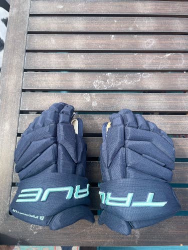 13.5” True Catalyst 9X Seattle Kraken Bjorkstrand #22 NHL Pro Stock Game Worn Gloves