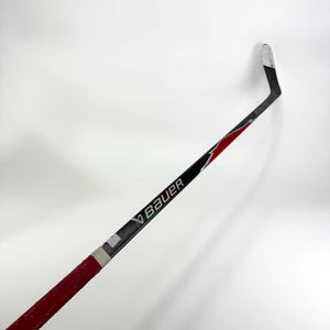 Used Left Red Bauer Flylite | 77 Flex P28M Curve Grip | A469