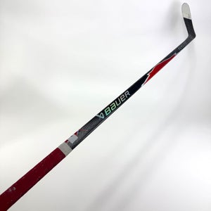 Used Left Red Bauer Flylite | 77 Flex P28M Curve Grip | A468