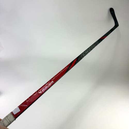 Used Left Red Bauer Nexus Tracer | 102 Flex Custom Satan Curve Grip | J564