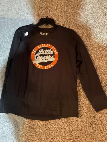 Women’s little Caesers team issued shirt