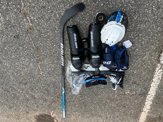 Bauer new never used hockey equipment. Hockey set