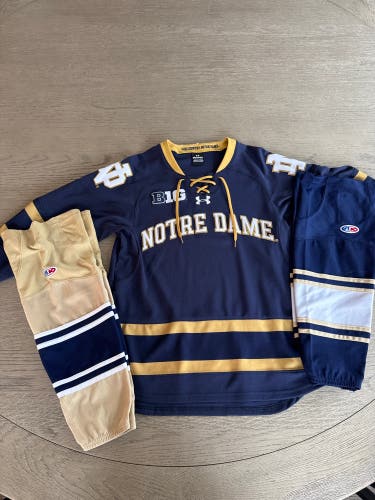 Notre Dame Hockey Jersey (Small by Under Armour) with 21” AK hockey socks (2 pairs)