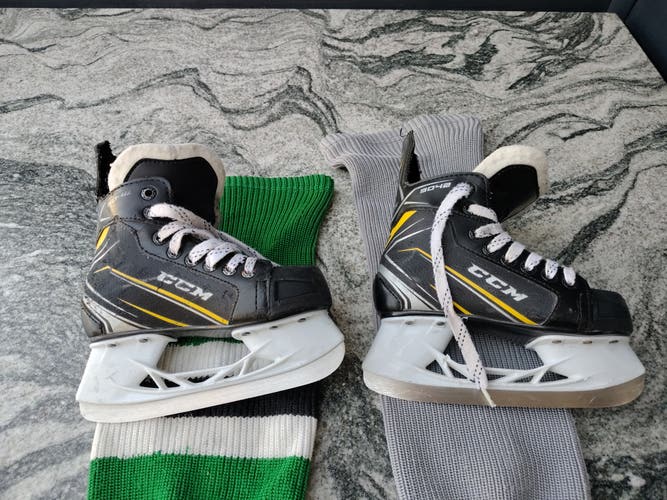 Black/Yellow CCM Tacks 9042 Hockey Skates 13 (Used)