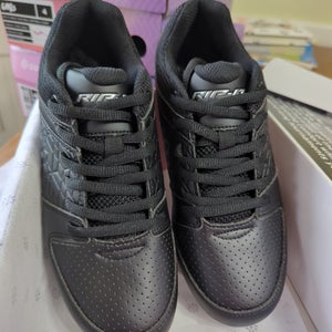 New Rip-it Girls Softball cleats size us5.5 black/white.