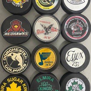 Vintage OHA hockey pucks