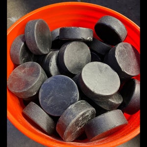 16 Regulation Hockey Pucks (used)