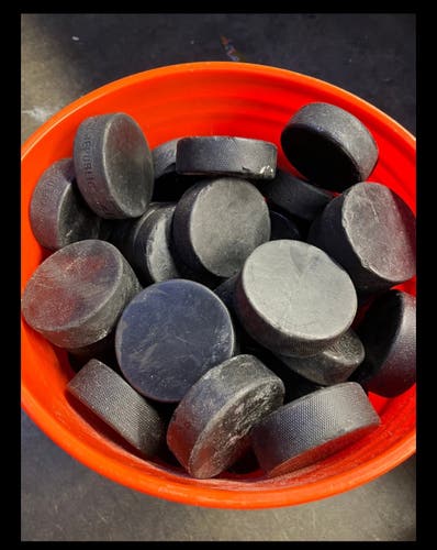 16 Regulation Hockey Pucks (used)