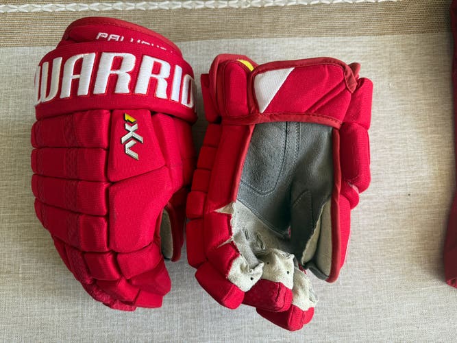 Warrior AX1 Pro Stock Gloves 13" (Used). Carolina Hurricanes