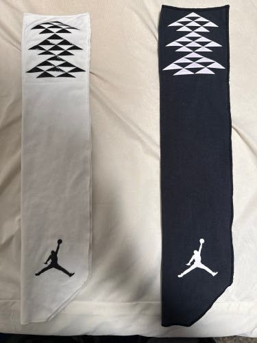 White or black Air Jordan towel (Used)