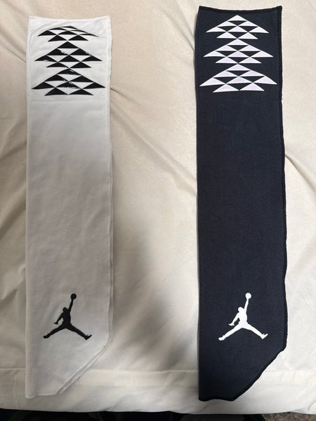 White or black Air Jordan towel (Used)