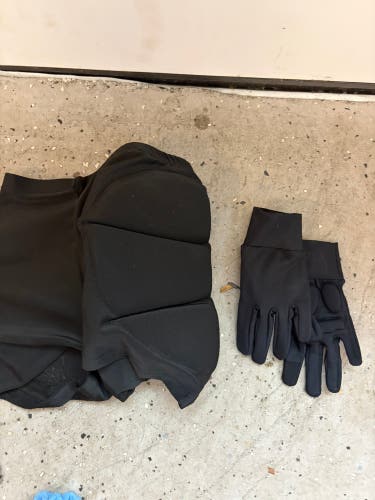 Figure skating pads, padded shorts, padded gloves, and silk socks small youth