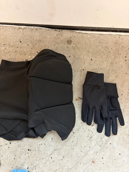 Figure skating pads, padded shorts, padded gloves, and silk socks small youth