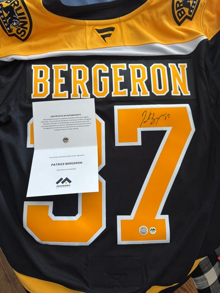 Boston Bruins Patrice Bergeron signed Fanatics Premium jersey, size 56, new with tags.