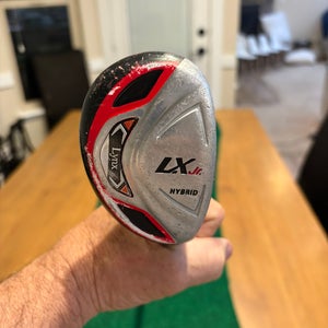 Jr Golf Hybrid club: Lynx LX Jr. Hybrid golf club, typically designed for junior golfers.
