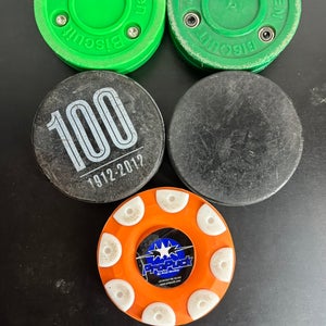 Used lot of 5 pucks/training pucks