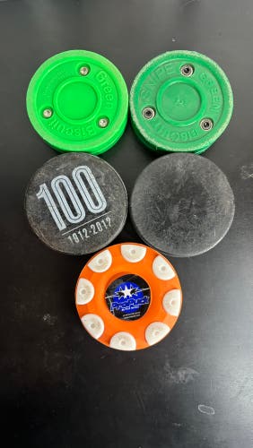 Used lot of 5 pucks/training pucks