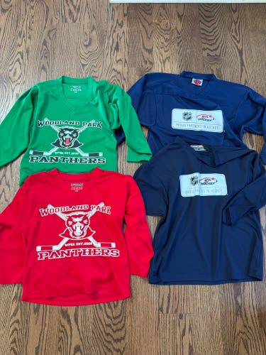 4 youth sized hockey practice jerseys