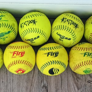 12 used softballs. Various brands. all playable!