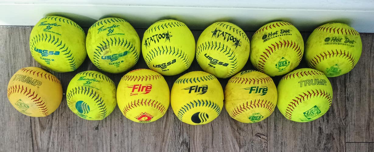 12 used softballs. Various brands. all playable!