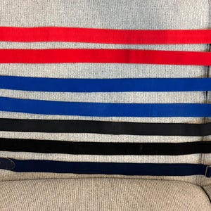 7 belts varying colors (Used)