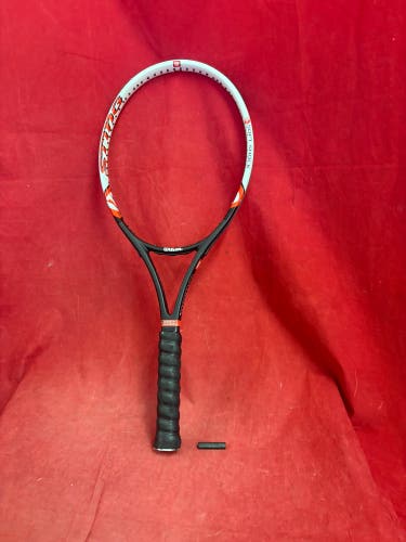 Tennis Racquet: Wilson Sting Graphite tennis racquet featuring the Soft Shock System. Grip: 43/8, he