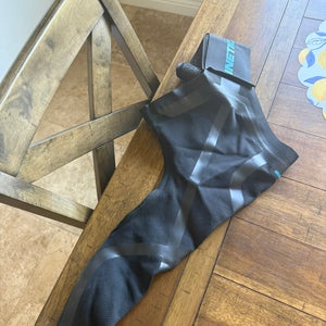 (Kinetic arm size adult small Used almost new)