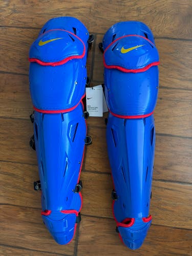 Nike Diamond Elite Catcher’s Leg Guards 17” Game Royal/University Red/Metallic Gold NEW