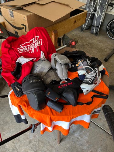 Hockey Goalie Accessories Lot Includes Knee Pads (2), Neck Guards (3), Jerseys (2), Jock/Cup, Etc…