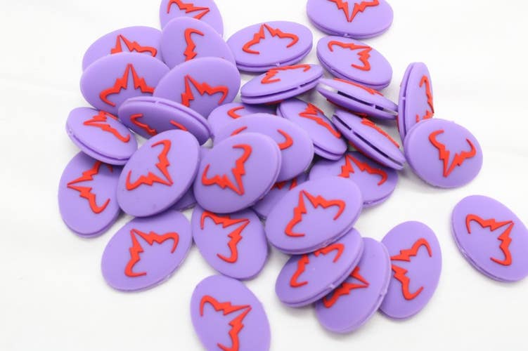 TWO (2X): RAFAEL NADAL PURPLE / RED LOGO VIBRATION DAMPENERS FOR TENNIS RACQUETS