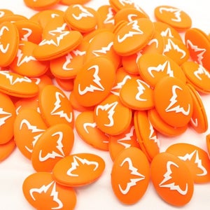 TWO (2X): RAFAEL NADAL ORANGE / WHT LOGO VIBRATION DAMPENERS FOR TENNIS RACQUETS